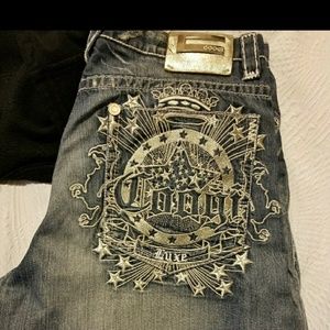 COOGI shorts with silver embelishments. Size 36